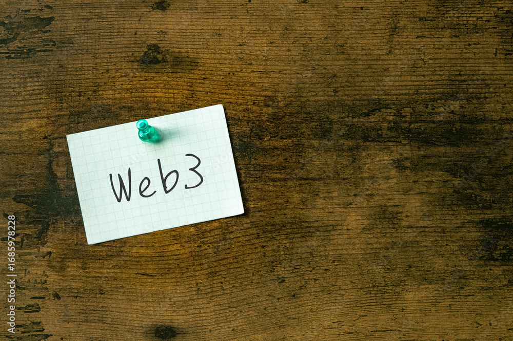 Poster there is a piece of paper with the word web3. it is as an eye-catching image.