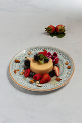 Sweet Indulgence: Flan and Strawberry Dessert