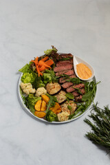 Rustic Steak and Potatoes on a Wooden Board