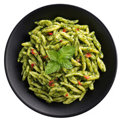 Pesto Pasta in black dish isolated on transparent background