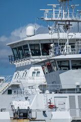 Wheelhouses of Two Ferries alongside each other  © jon