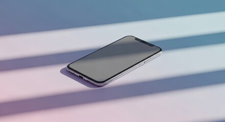 Sleek smartphone rests on a surface, bathed in colorful, slanted light.