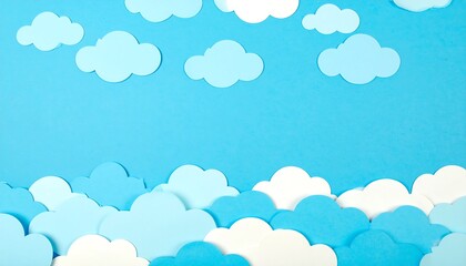 A vibrant, paper-cut sky scene showcases various shades of blue and white clouds against a vivid backdrop.