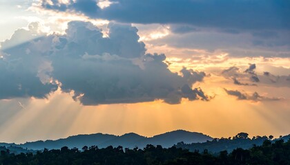 Dramatic sunset sky over a mountain range