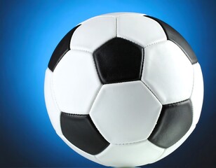 Fototapeta premium Soccer ball against a vibrant blue backdrop