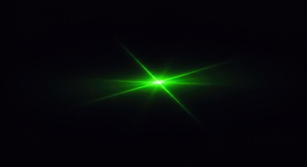 Fototapeta premium A bright green light flare emanating from a central point on a black background with starburst effect