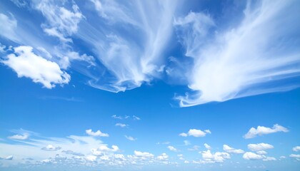 Vibrant blue sky adorned with fluffy clouds