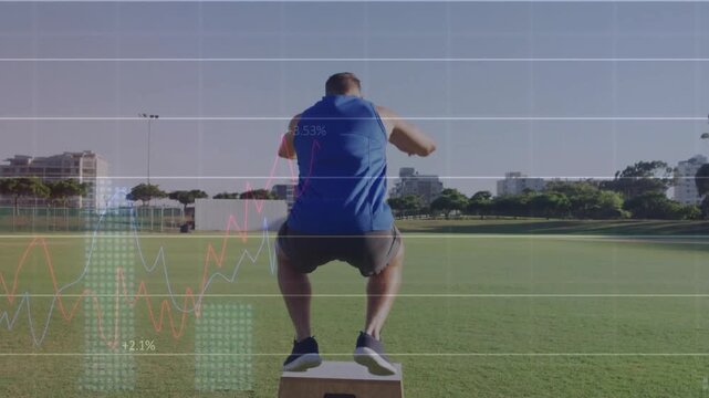 Man approaching box on sports field jumping onto box and generating holographic metrics