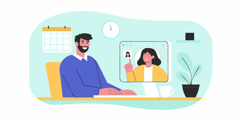 Man participating in a video conference call with a colleague from his home office setup