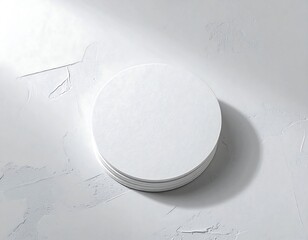 White circular podium on textured surface