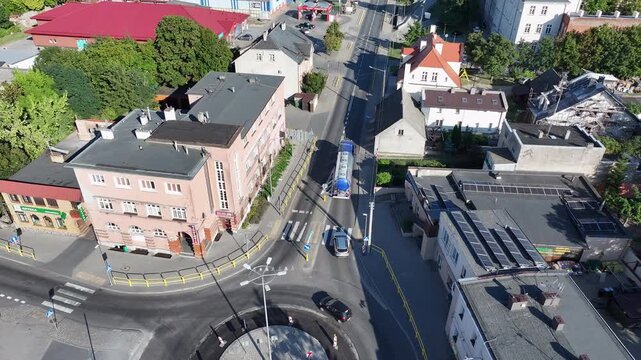 Aerial Strzelno Poland round about follow traffic. Central north Poland. German occupation World War II. Farm rural area. Historical trade and religious center. Historic buildings rural village.