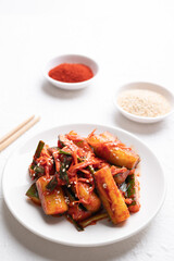 Korean kimchi cucumber on white plate, Korean side dish, Homemade food