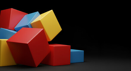 Obraz premium A visually appealing composition of stacked red, yellow, and blue cubes on black backdrop