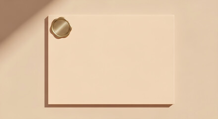 A golden wax seal is attached to the corner of a beige textured rectangle against a neutral