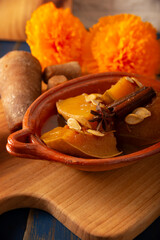 Calabaza en Tacha. Spiced Candied Pumpkin. Mexican dessert whose main ingredients are pumpkin and piloncillo, also known as Chacualole or Dulce de Calabaza, widely used in Day of the Dead offerings.