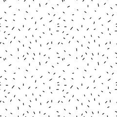 Geometric pattern in black and white, featuring an arrangement of triangles that creates visual interest.