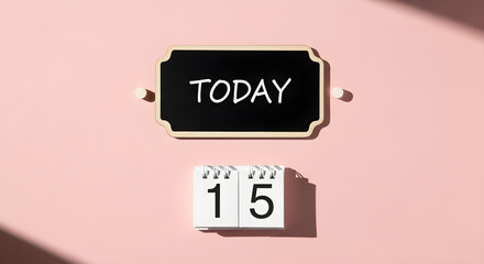 A small chalkboard displaying the word TODAY hangs above a flip calendar showing the number 15 on a pink  with shadows