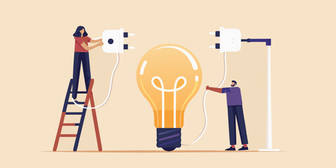 Two people working together to connect a giant light bulb to power for a bright new idea