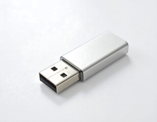 Silver USB flash drive on white background