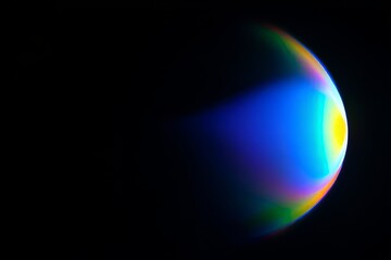 Rainbow Bubble Isolated on Black Background - Abstract Refraction and Color