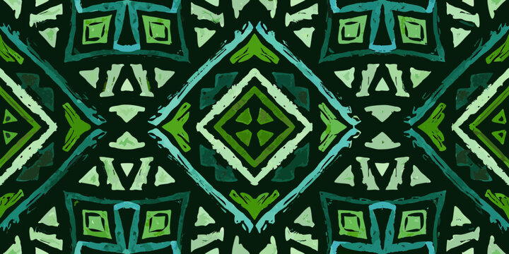 Tribal geometric seamless pattern with green and blue brush strokes on dark background