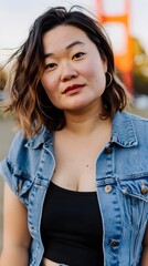 The Golden Gate Bridge emerging from mystical fog with woman portrait image   