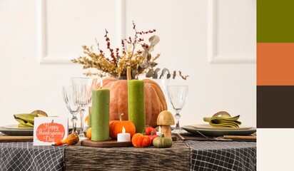 Festive table setting for Thanksgiving Day with pumpkins and candles. Different color patterns