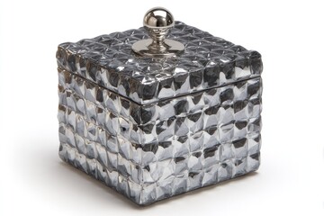 Cube-shaped box with textured metallic surface and a small knob on top