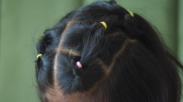 Creative hairstyle ideas for kids with colorful accessories