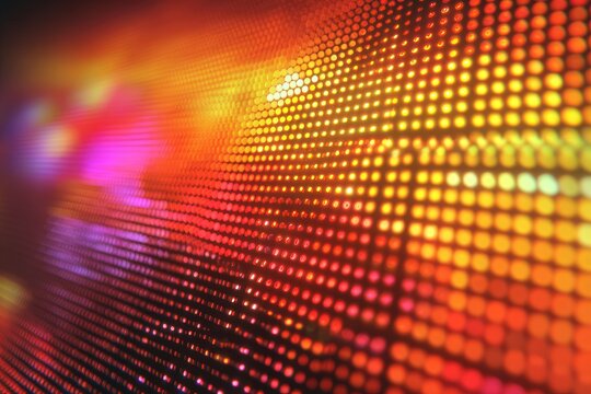 Abstract digital display of warm-toned, glowing dots forming a wave-like pattern