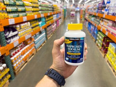 Kirkland Naproxen Sodium Pain Reliever Bottle in Warehouse Aisle