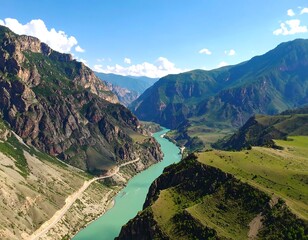 Mountainous river valley, sunny day