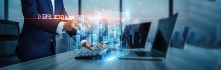 Enterprise resource planning concept. Hand touching ERP integration modules and systems, data connection on virtual screen finance inventory HR logistics automation workflows optimization scalability.
