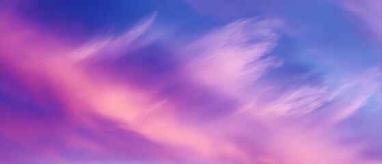 Fototapeta premium Vibrant colorful sky with wispy clouds du sunset creating a serene and dreamy atmospheric scene with soft pastel tones