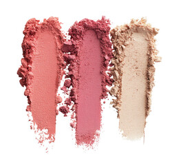 Three swatches of crushed blush and highlighter.  Atop a black background, three vertical streaks of different shades of pink and peach colored crushed powder makeup are shown