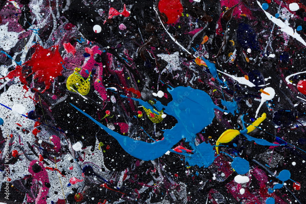Poster macro close-up of an abstract, messy and colorful acrylic paints on black background. splashes, blob