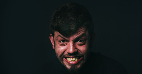 Anger, stress and portrait of man in studio for psychology, panic and schizophrenia symptoms. Fear,...