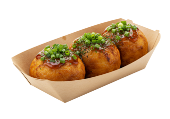Fried balls food dish in cardboard take away box overhead view