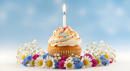Birthday cupcake with candle and flowers blue background 
