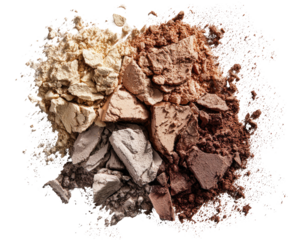 Close-up of crumbled, assorted powders.  Four colors, light yellow, beige, taupe, and brown, are blended.  Powder textures are rough