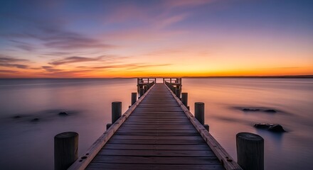 Obraz premium Serene Sunset Pier with Ocean View.