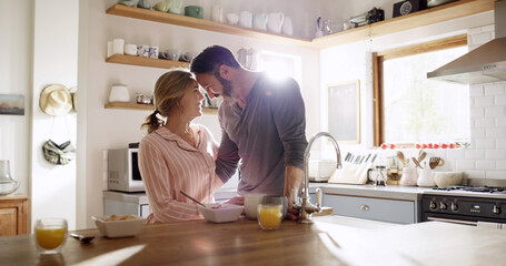 Breakfast, love and couple in kitchen with smile, connection and bonding in healthy marriage. Romantic, morning or people in home together with flare, meal prep or nutrition for happy relationship.