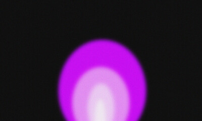 Abstract purple light on a black background creating a modern and artistic image with a glowing effect for backgrounds and designs