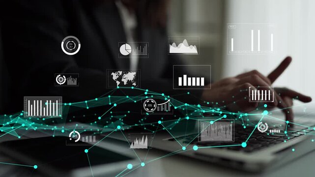 A business professional engages with various digital graphics and charts on a laptop, showcasing modern analytical techniques within a contemporary office setting. Xenic - Powered by Adobe