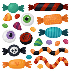 Collection of Halloween candies. Chocolate candies in a wrapper, lollipops, caramel, gummy worms, gummy eyeballs. Trick or treat, Halloween treats, many different sweets.