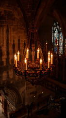 Naklejka premium Chandelier in the interior of the church. 3D rendering. Selective focus on the lamp.