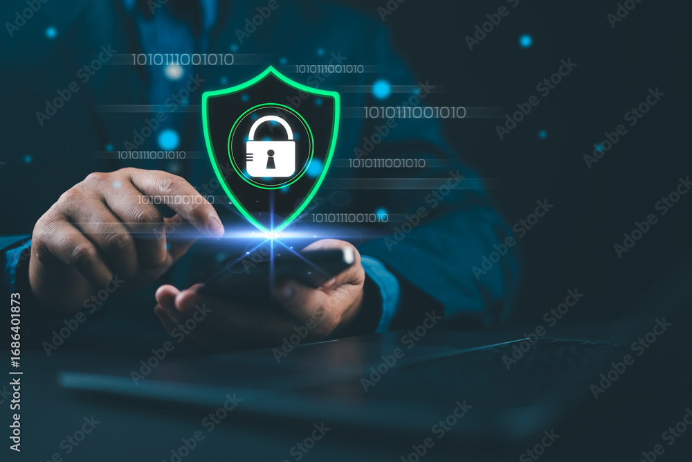 Fototapete cybersecurity and digital data protection, close-up of a businessman using a smartphone with a digit