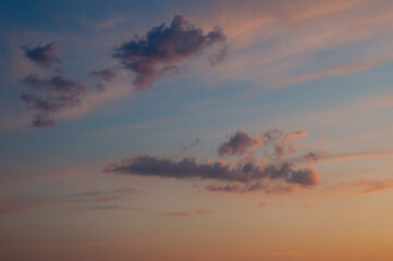The sky displays a stunning blend of colors as the sun sets, creating a gorgeous atmosphere.
