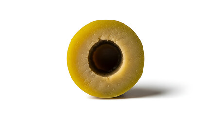 A cross sectional view of a green olive showing the pit removed on a white background in bright...