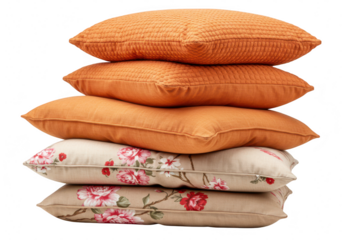 Stack of five orange and floral print decorative pillows isolated on transparent background